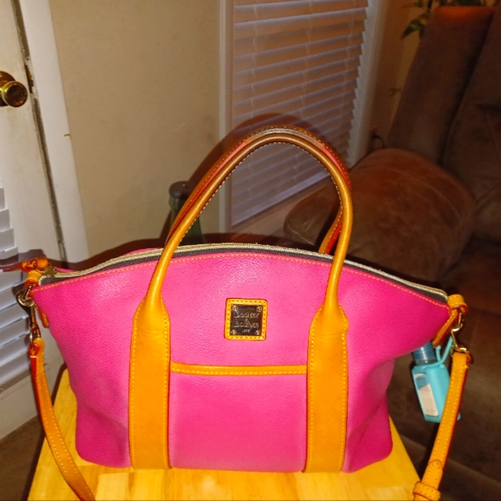 Large Pink bag with handles and a strap